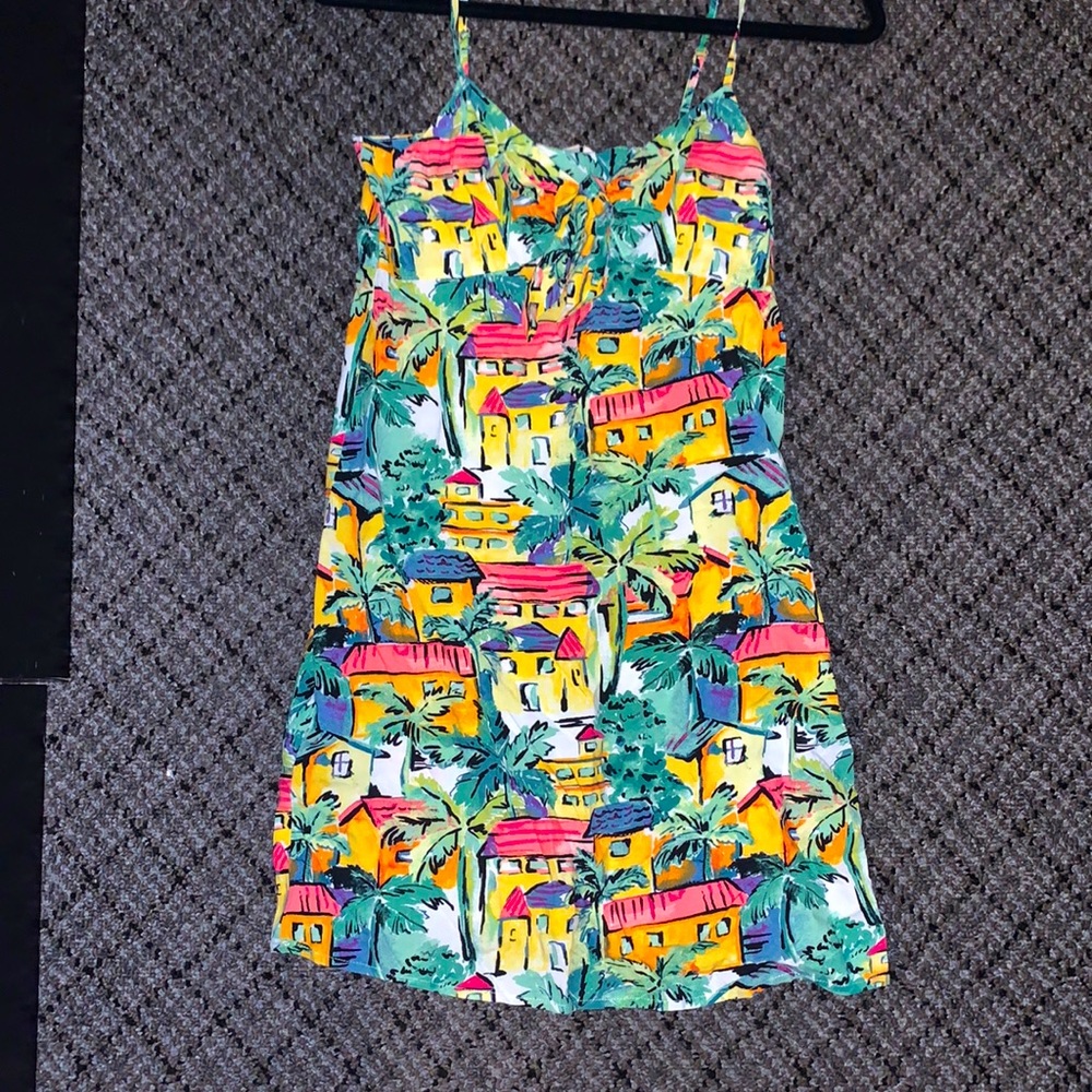 Sleeveless dress with knot